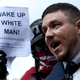 WASHINGTON, DC - AUGUST 11: Jason Kessler (C), who organized the rally, speaks as white supremacists, neo-Nazis, members of the Ku Klux Klan and other hate groups gather for the Unite the Right rally in Lafayette Park across from the White House August 12, 2018 in Washington, DC. Thousands of protesters are expected to demonstrate against the "white civil rights" rally, which was planned by the organizer of last year’s deadly rally in Charlottesville, Virginia.
